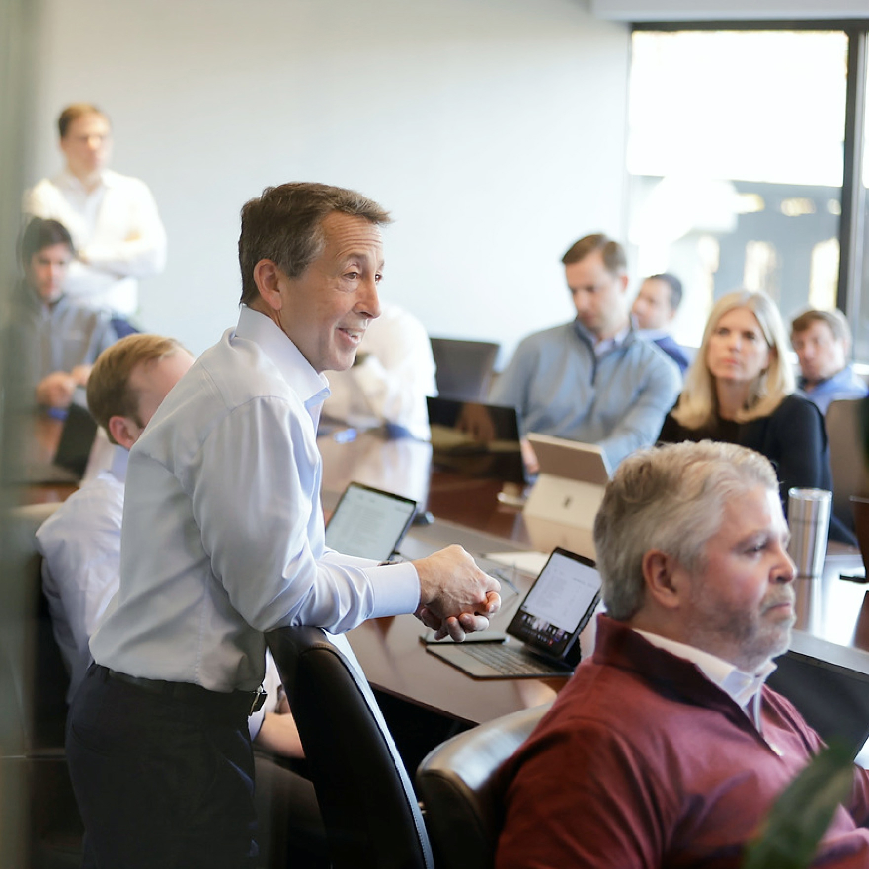 Business meeting with professionals discussing a presentation