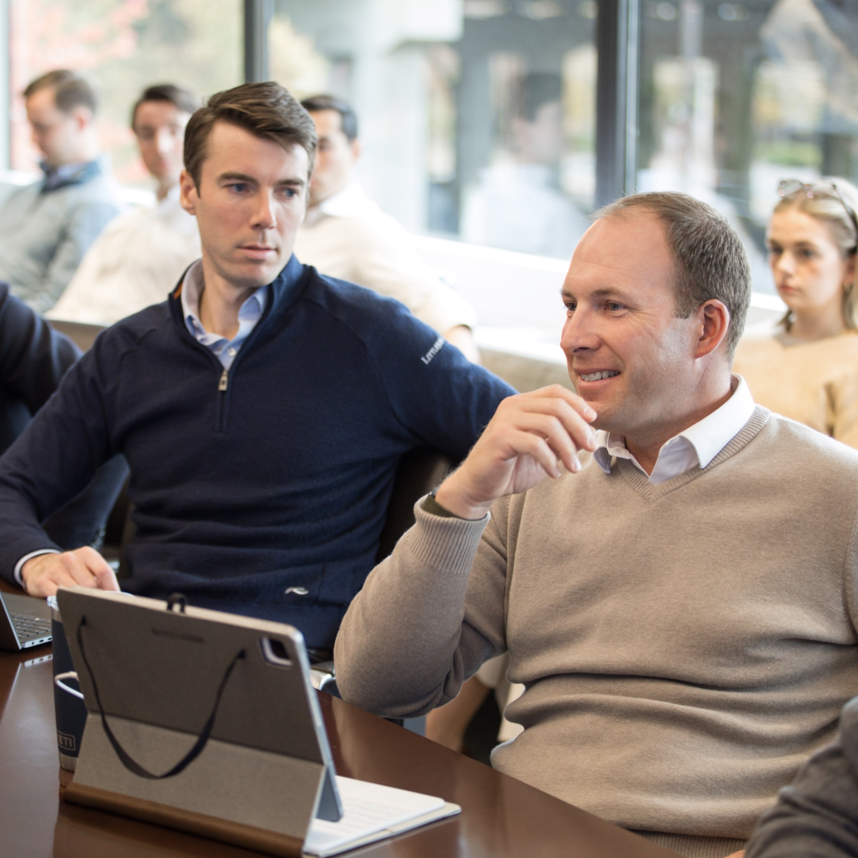 Business meeting with professionals and digital devices
