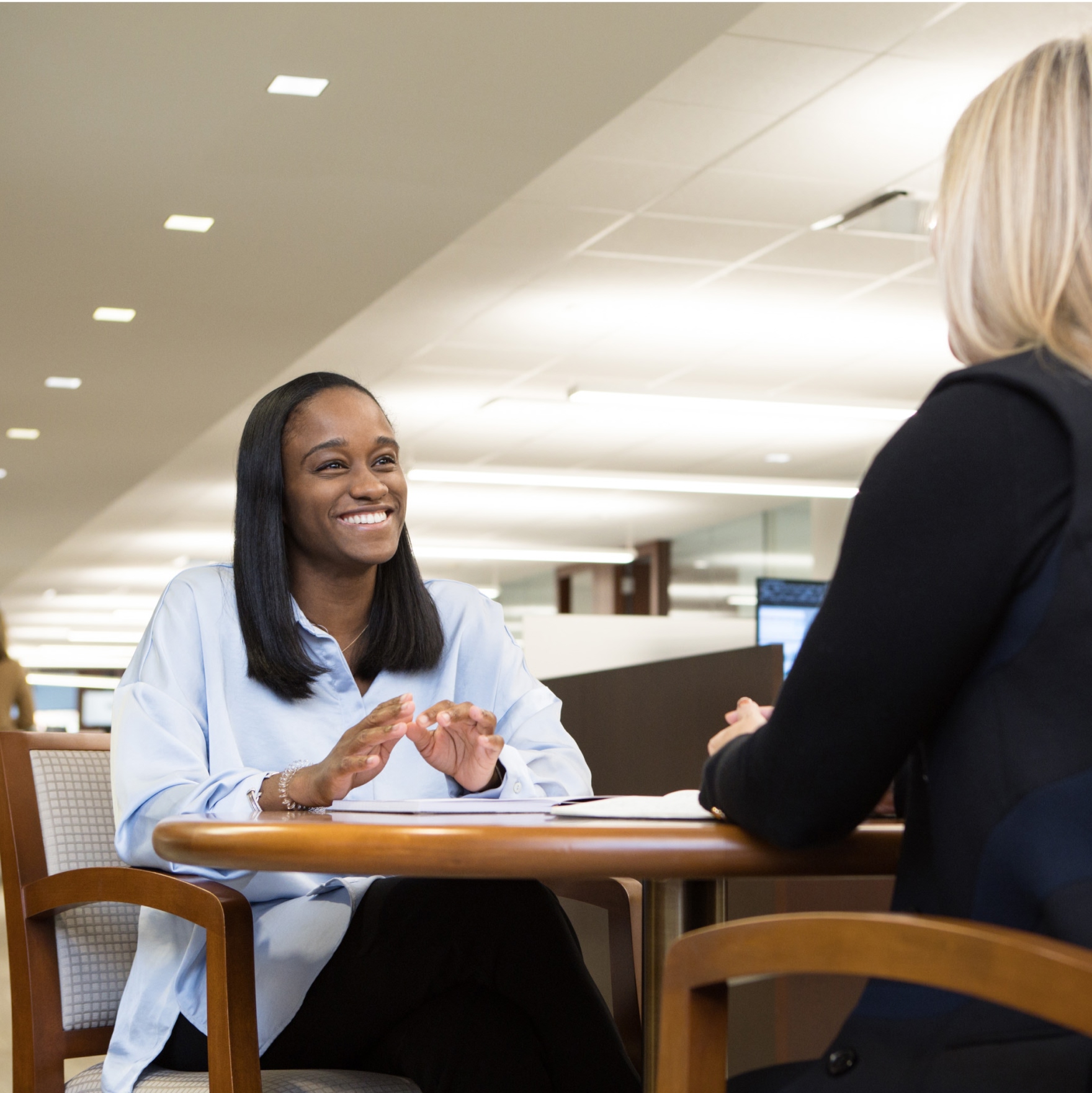 Two professionals having a meeting in office