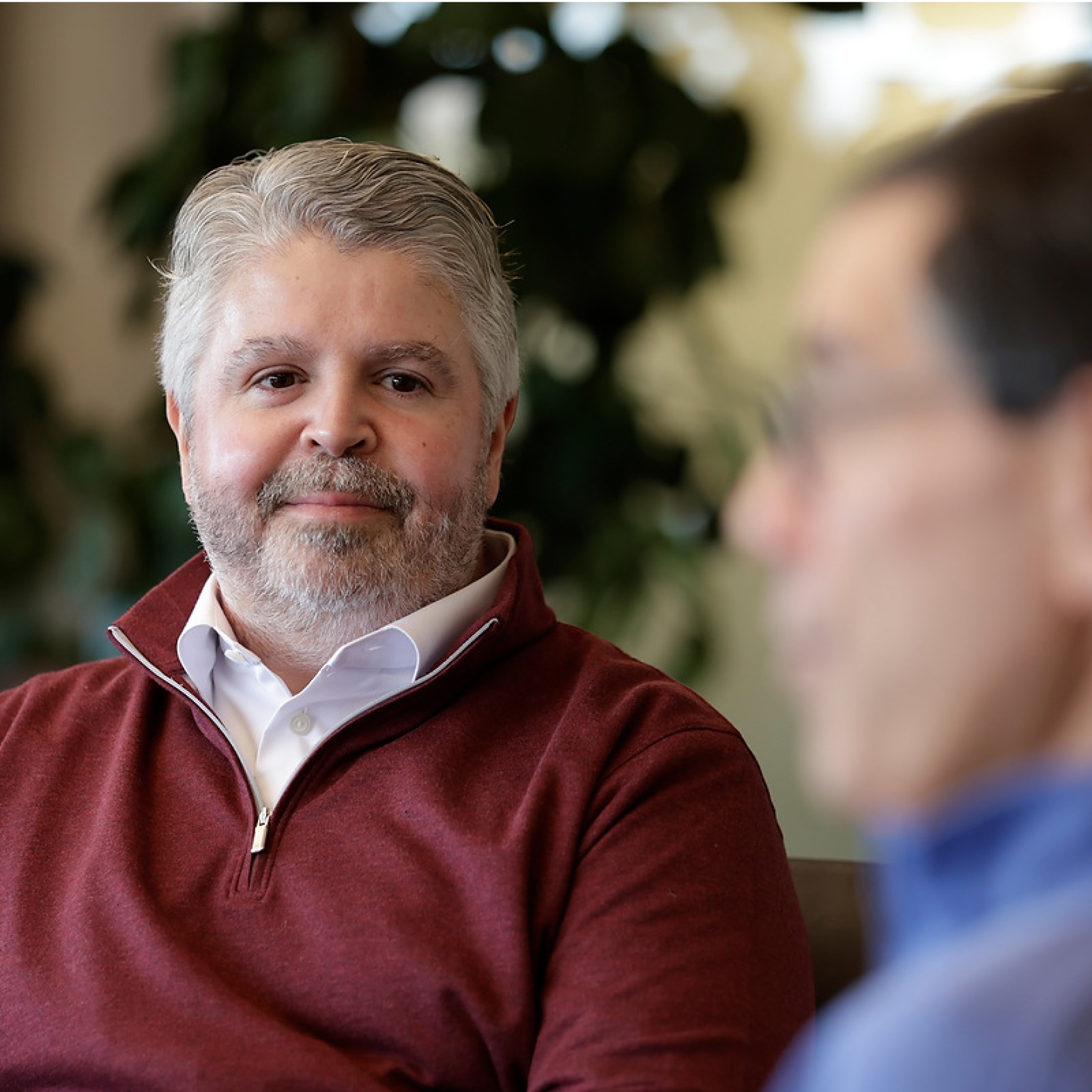 Two men having a professional discussion indoors